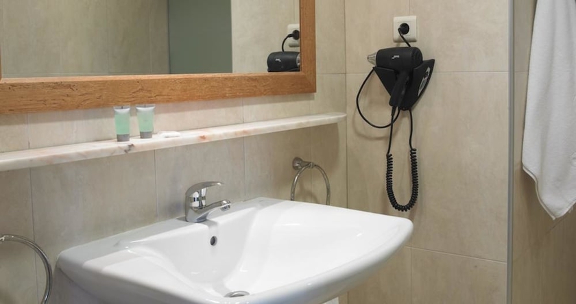 Imagen de la habitación del Aparthotel Londres. Foto 17