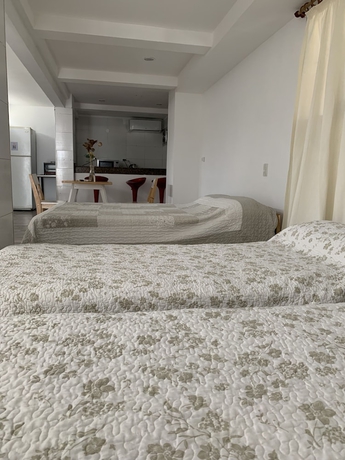 Imagen de la habitación del Aparthotel Lujan Homes. Foto 9