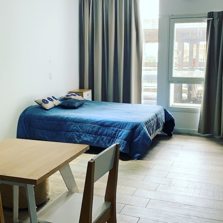 Imagen de la habitación del Aparthotel Lujan Homes. Foto 13