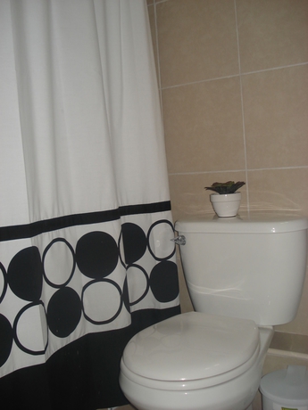 Imagen de la habitación del Aparthotel Luna Suite Departamentos. Foto 3