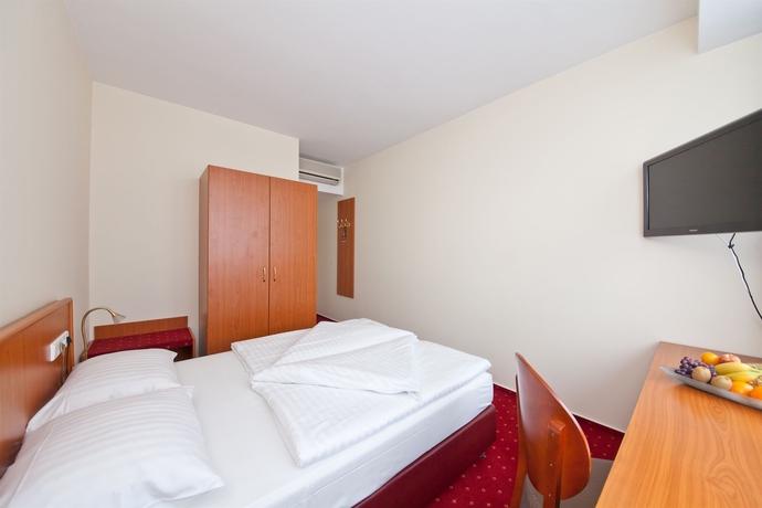 Imagen de la habitación del Aparthotel MIAMI House. Foto 6