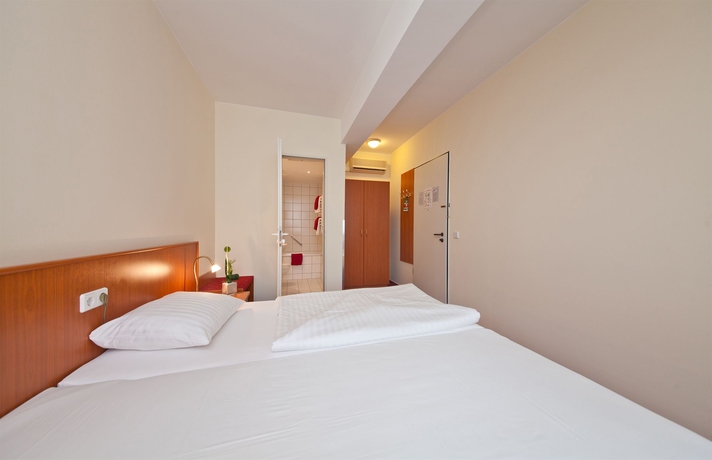 Imagen de la habitación del Aparthotel MIAMI House. Foto 8