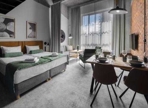 Imagen de la habitación del Aparthotel MONTOWNIA Lofts and Experience. Foto 14