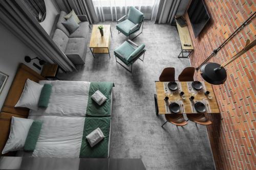 Imagen de la habitación del Aparthotel MONTOWNIA Lofts and Experience. Foto 15