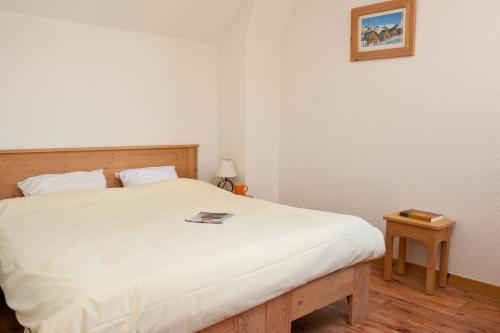 Imagen de la habitación del Aparthotel Madame Vacances Les Chalets du Berger Premium. Foto 4