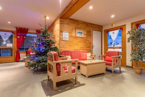 Imagen de los interiores del Aparthotel Madame Vacances Les Chalets du Berger Premium. Foto 8