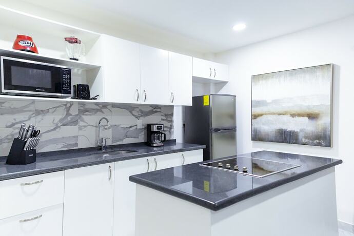Imagen de la habitación del Aparthotel Morgan and Residences. Foto 13