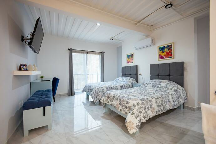 Imagen de la habitación del Aparthotel Morgan and Residences. Foto 16