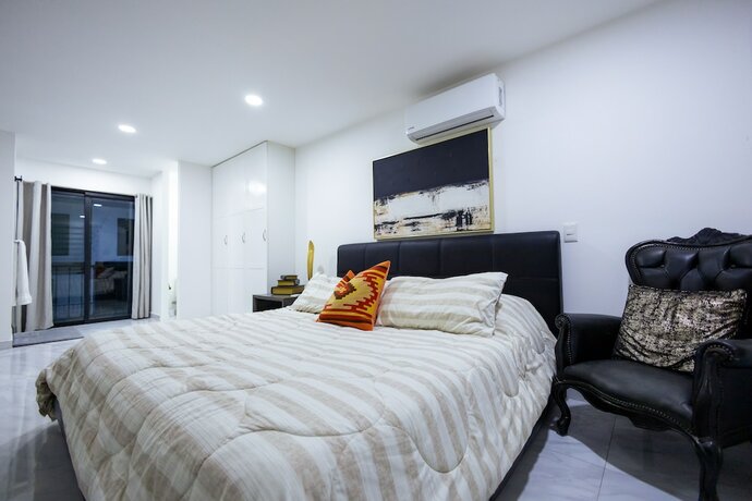 Imagen de la habitación del Aparthotel Morgan and Residences. Foto 17