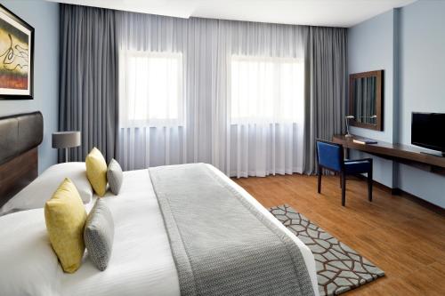 Imagen de la habitación del Aparthotel Movenpick Apartments Al Mamzar Dubai. Foto 16