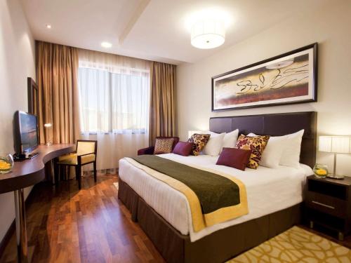 Imagen de la habitación del Aparthotel Movenpick Apartments Al Mamzar Dubai. Foto 17