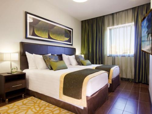 Imagen de la habitación del Aparthotel Movenpick Apartments Al Mamzar Dubai. Foto 19
