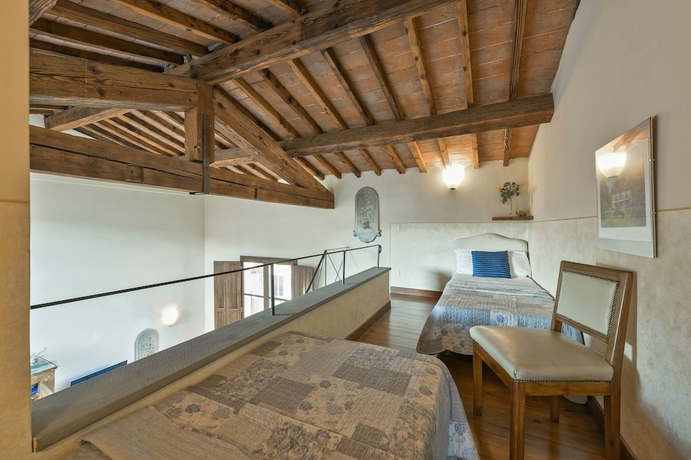 Imagen de la habitación del Aparthotel Msn Suites Palazzo Uguccioni. Foto 8