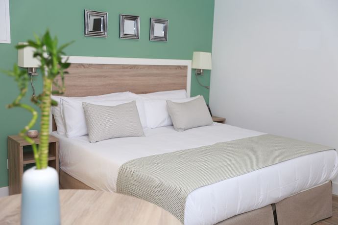Imagen de la habitación del Aparthotel New Point Opera. Foto 8