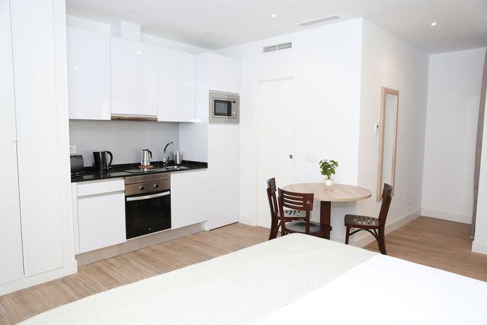 Imagen de la habitación del Aparthotel New Point Opera. Foto 10