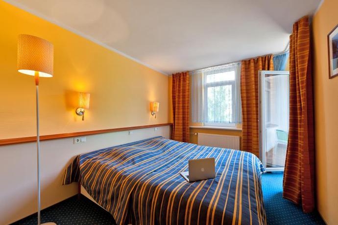 Imagen de la habitación del Aparthotel Nidus. Foto 3