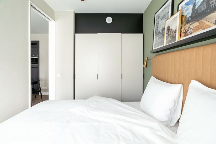 Imagen de la habitación del Aparthotel Numa Antwerp Opera. Foto 12