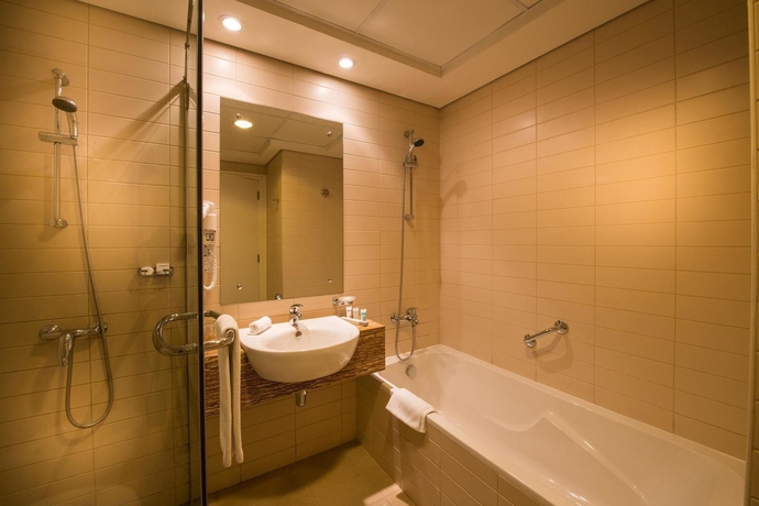 Imagen de la habitación del Aparthotel Oaks Liwa Heights Suites. Foto 1