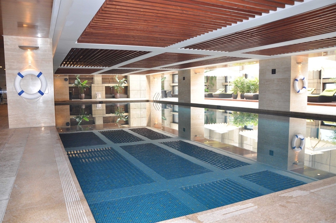 Imagen de la piscina del Aparthotel Oakwood Premier Guangzhou. Foto 16