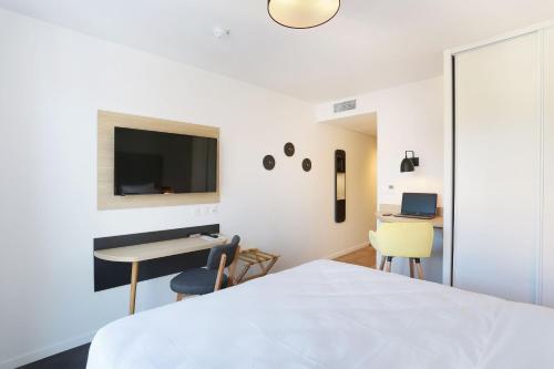 Imagen de la habitación del Aparthotel Odalys City Toulouse Centre Compans Caffarelli. Foto 15