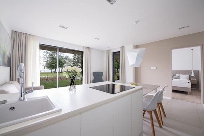 Imagen de la habitación del Aparthotel OliverLux Aparthotel. Foto 10