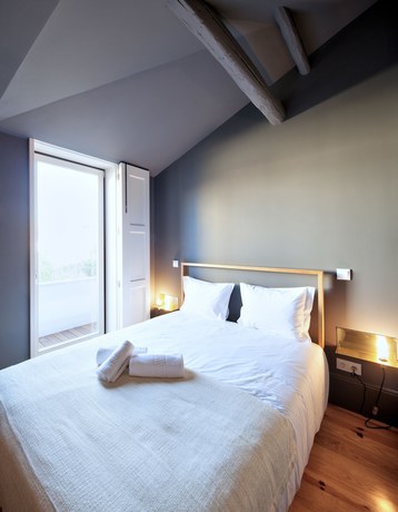 Imagen de la habitación del Aparthotel Oporto Batalha. Foto 12