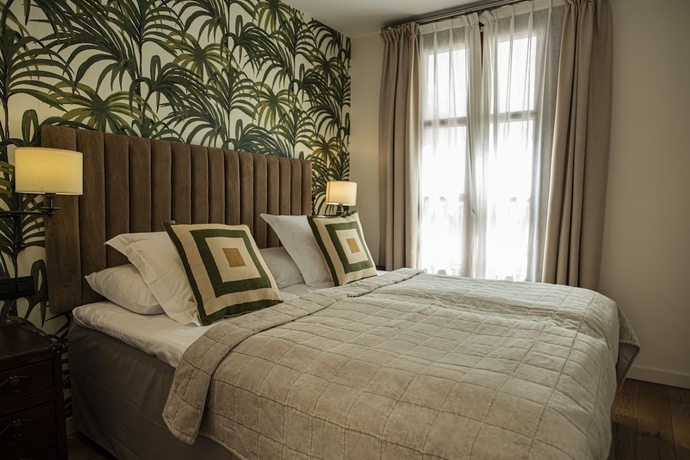 Imagen de la habitación del Aparthotel Palma Suites. Foto 9