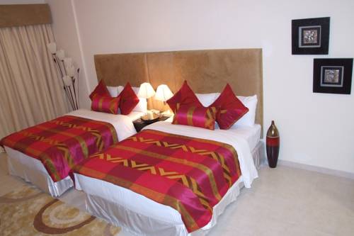 Imagen de la habitación del Aparthotel Parkside Suites. Foto 14