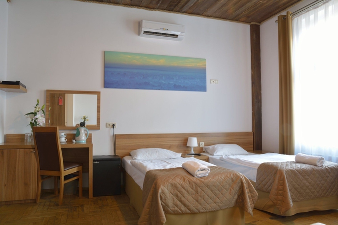 Imagen de la habitación del Aparthotel Pergamin. Foto 7