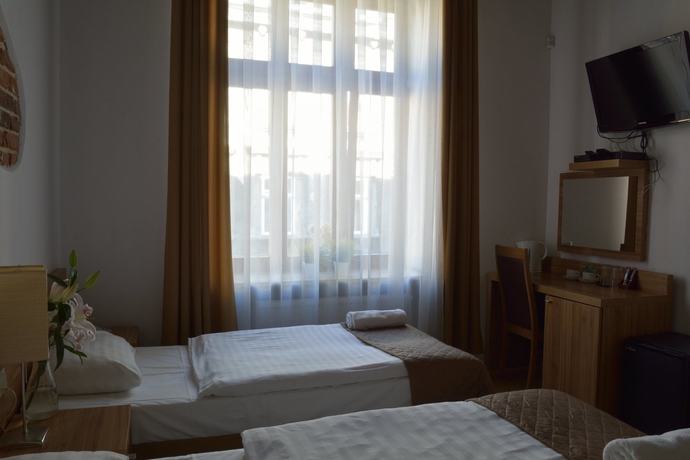 Imagen de la habitación del Aparthotel Pergamin. Foto 9