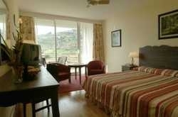 Imagen de la habitación del Aparthotel Pestana Atalaia Ocean Aparthotel. Foto 21