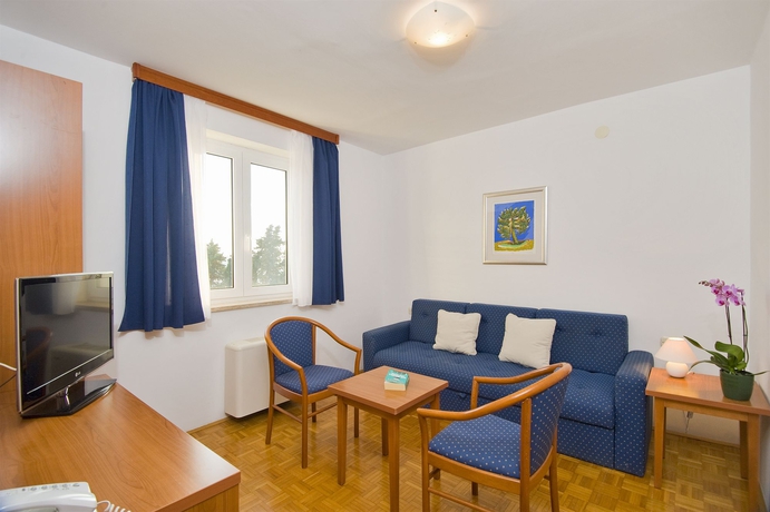 Imagen de la habitación del Aparthotel Pharia. Foto 8