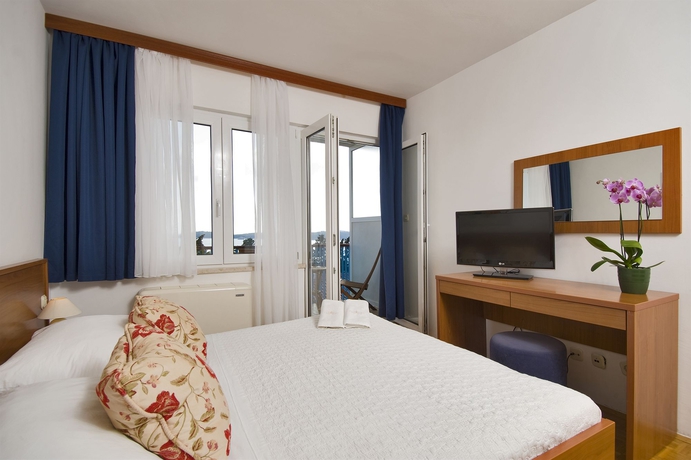 Imagen de la habitación del Aparthotel Pharia. Foto 9