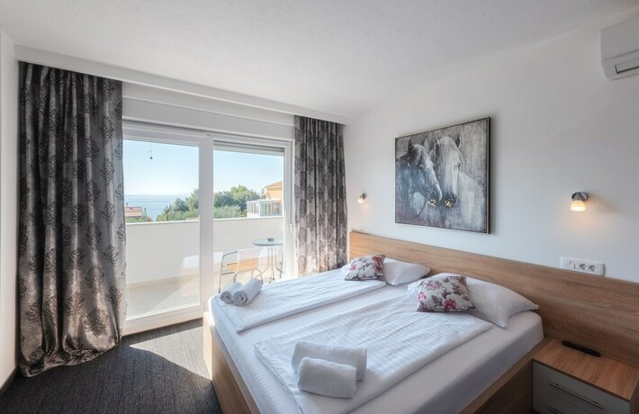 Imagen de la habitación del Aparthotel Plat. Foto 12