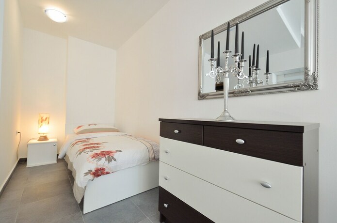 Imagen de la habitación del Aparthotel Plat. Foto 14