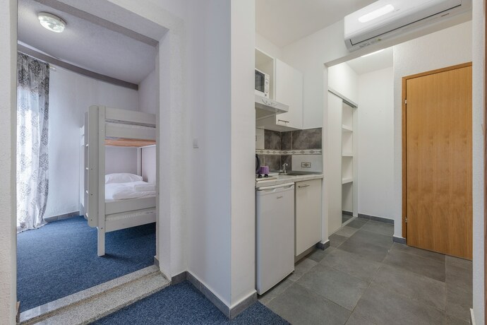 Imagen de la habitación del Aparthotel Plat. Foto 30