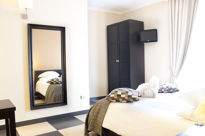 Imagen de la habitación del Aparthotel Plebiscito. Foto 8
