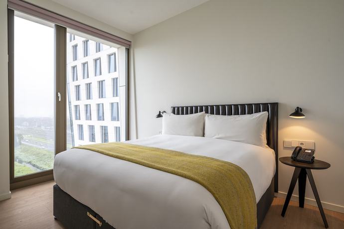 Imagen de la habitación del Aparthotel Premier Suites Plus Amsterdam. Foto 6