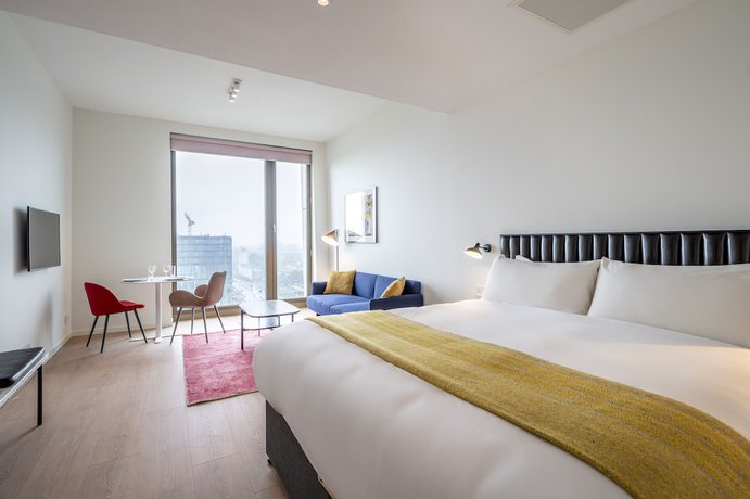 Imagen de la habitación del Aparthotel Premier Suites Plus Amsterdam. Foto 9