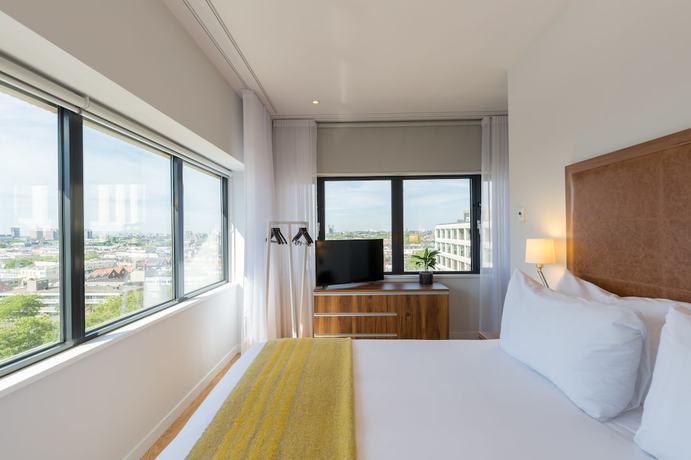 Imagen de la habitación del Aparthotel Premier Suites Plus Amsterdam. Foto 13