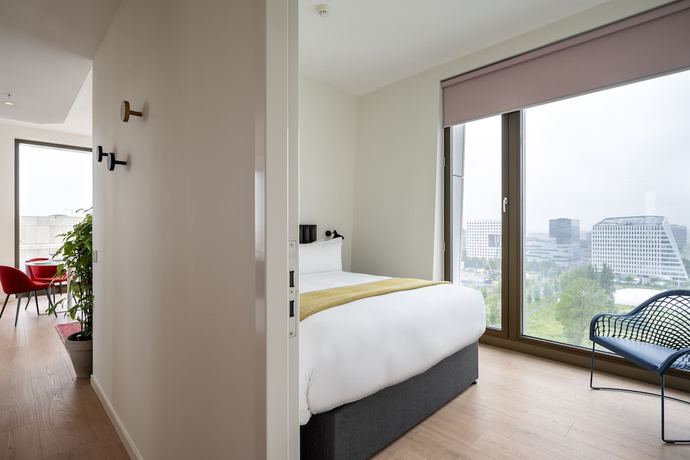 Imagen de la habitación del Aparthotel Premier Suites Plus Amsterdam. Foto 15