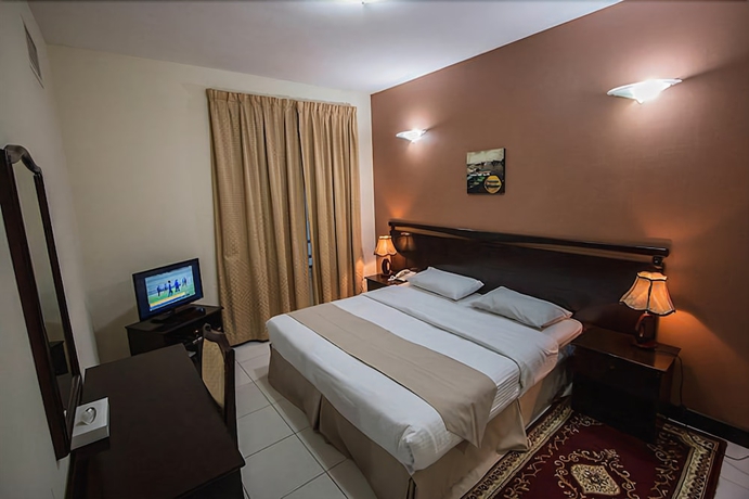 Imagen de la habitación del Aparthotel Premiere Hotel Apartments. Foto 7