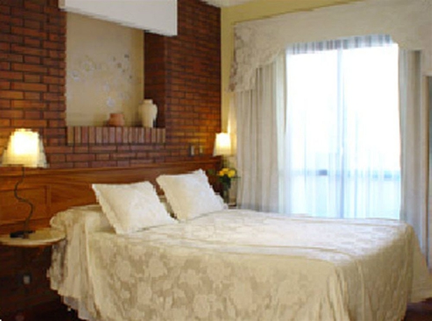 Imagen de la habitación del Aparthotel Reina Victoria Suites and Towers. Foto 5