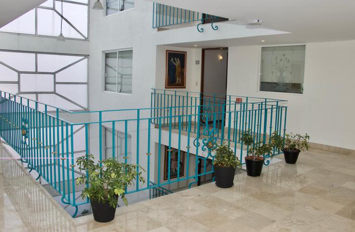 Imagen general del Aparthotel Residence L'heritage Hip&oacute;lito Taine By Bluebay. Foto 11