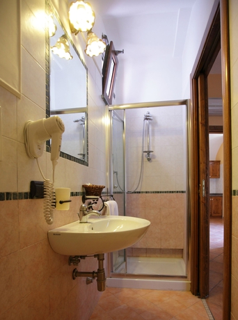 Imagen de la habitación del Aparthotel Residence L'incanto. Foto 11