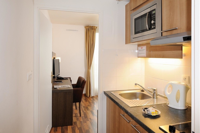 Imagen de la habitación del Aparthotel Residhome Asni&egrave;res. Foto 5