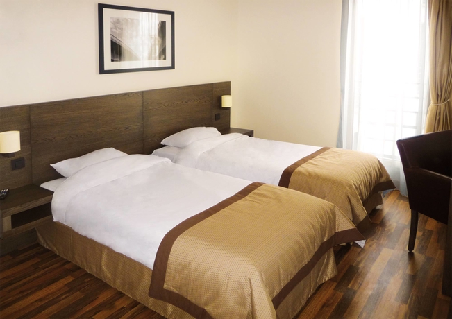 Imagen de la habitación del Aparthotel Residhome Asni&egrave;res. Foto 8