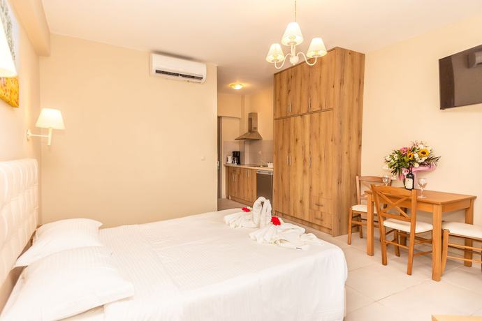 Imagen de la habitación del Aparthotel Robolla Beach Aparthotel. Foto 3
