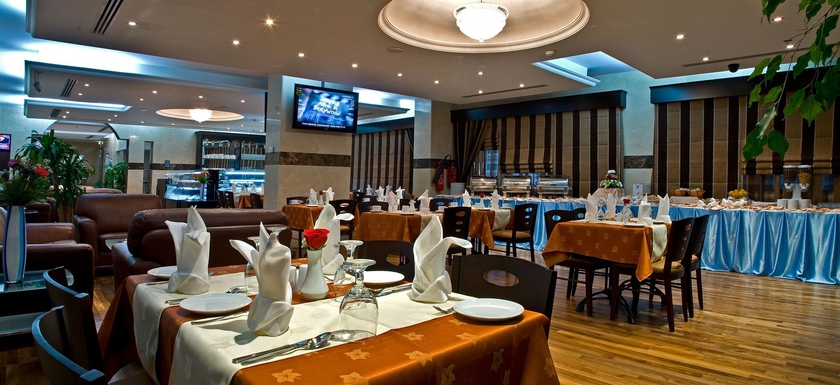 Imagen del bar/restaurante del Aparthotel Rose Garden Hotel Apartments Barsha. Foto 2