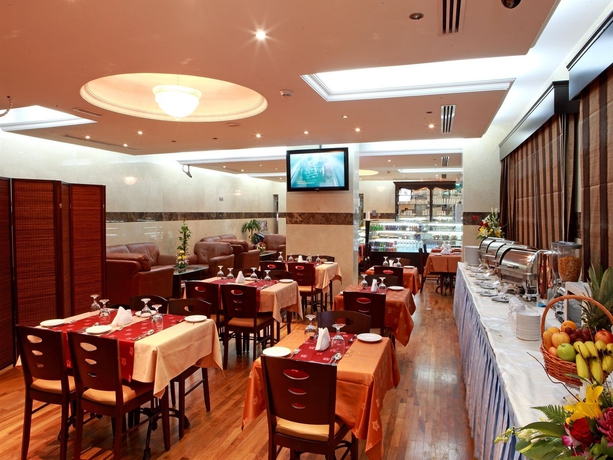 Imagen del bar/restaurante del Aparthotel Rose Garden Hotel Apartments Barsha. Foto 3